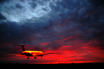 Image showing Air travel - plane and sunset