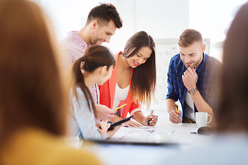 Image showing happy creative team or students working at office