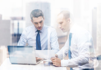 Image showing two businessmen having discussion in office