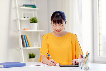 Image showing asian woman student with tablet pc at home