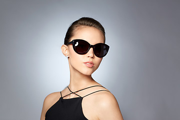 Image showing beautiful young woman in elegant black sunglasses