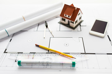 Image showing close up of architectural blueprint and tools