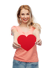 Image showing happy woman or teen girl with red heart shape