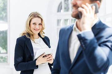 Image showing Male and female office workers.