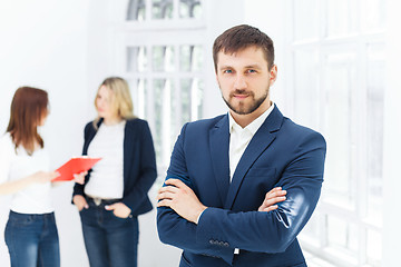 Image showing Male and female office workers.