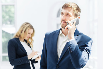 Image showing Male and female office workers.