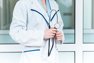 Image showing Doctor with a stethoscope in the hands