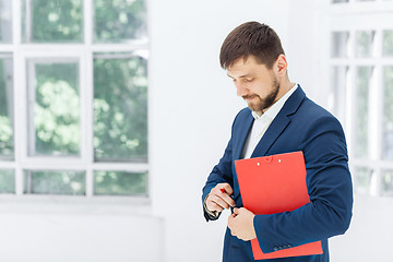 Image showing The male office worker