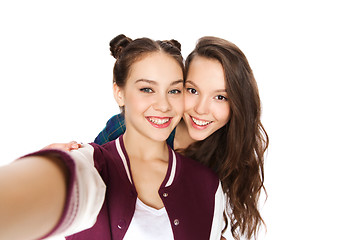 Image showing happy smiling pretty teenage girls taking selfie