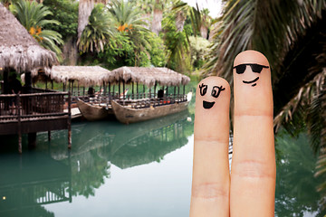 Image showing close up of two fingers with smiley faces