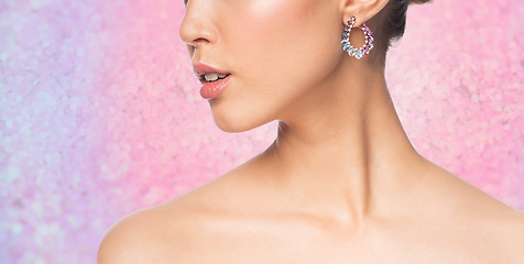 Image showing close up of beautiful woman face with earring