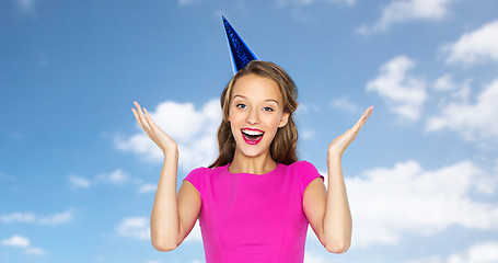 Image showing happy young woman or teen girl in party cap