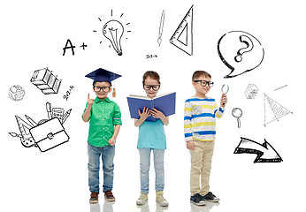 Image showing kids in glasses with book, lens and bachelor hat