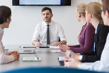 Image showing young business people group on team meeting at modern office