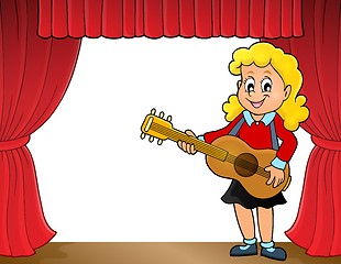 Image showing Girl guitar player on stage theme 1