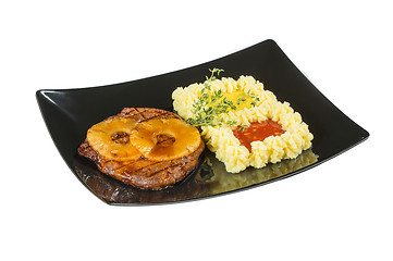 Image showing Pork tenderloin with grilled pineapple. Macro. Isolated white background