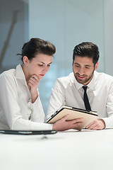 Image showing young business couple working together on project