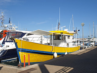 Image showing yellow and blue boat