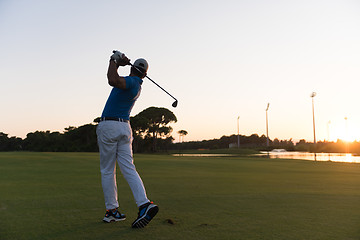 Image showing golfer hitting long shot