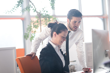 Image showing business couple working together on project