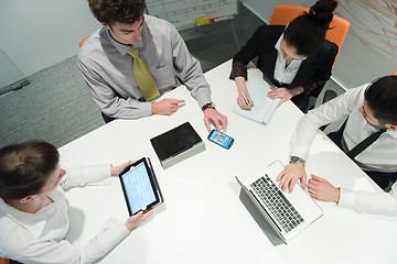 Image showing aerial view of business people group brainstorming on meeting