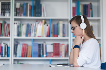 Image showing female student study in library