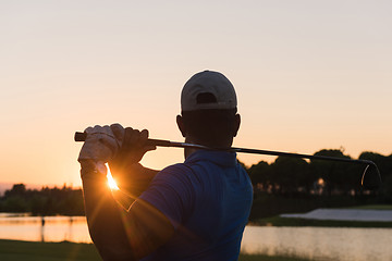 Image showing golfer hitting long shot