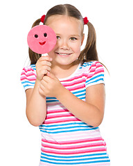 Image showing Little girl with lollipop