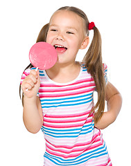 Image showing Little girl with lollipop