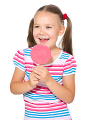 Image showing Little girl with lollipop