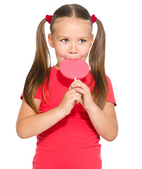 Image showing Little girl with lollipop