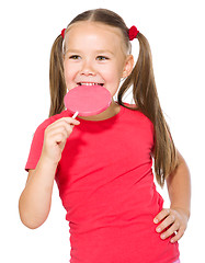 Image showing Little girl with lollipop