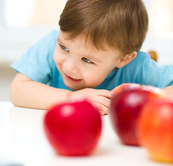 Image showing Portrait of a happy little boy with apples