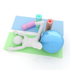 Image showing 3d man on a karemat with fitness ball. 3D illustration