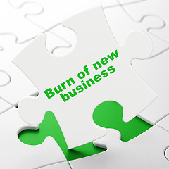 Image showing Finance concept: Burn Of new Business on puzzle background