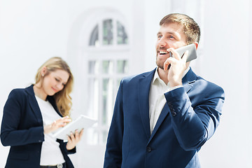 Image showing Male and female office workers.