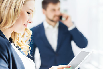 Image showing Male and female office workers.