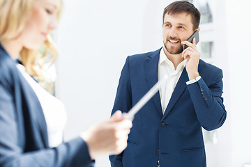 Image showing Male and female office workers.