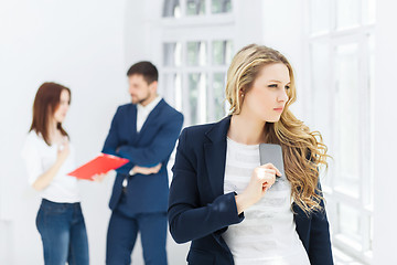 Image showing Portrait of businesswoman talking on phone in office