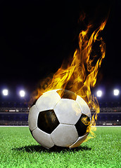 Image showing fiery soccer ball on stadium