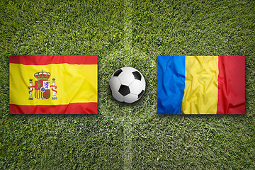 Image showing Spain vs. Romania flags on soccer field