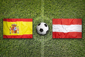 Image showing Spain vs. Austria flags on soccer field