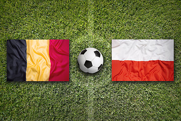 Image showing Belgium vs. Poland flags on soccer field