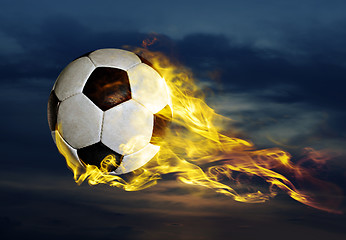 Image showing flying fiery soccer ball