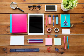 Image showing close up of school supplies and tablet pc