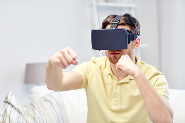 Image showing young man in virtual reality headset or 3d glasses