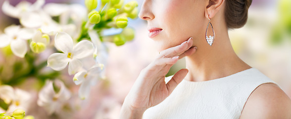 Image showing close up of beautiful woman face with earring