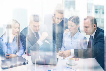 Image showing business team with laptop having discussion