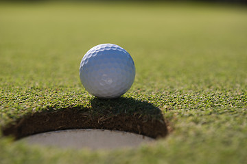 Image showing golf ball in the hole