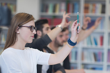 Image showing group of students  raise hands up